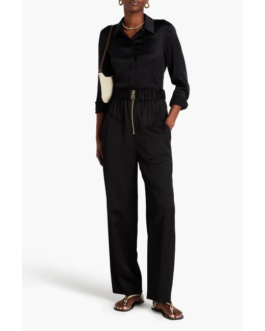 Khaite Black Felton hose mit weitem bein aus satin