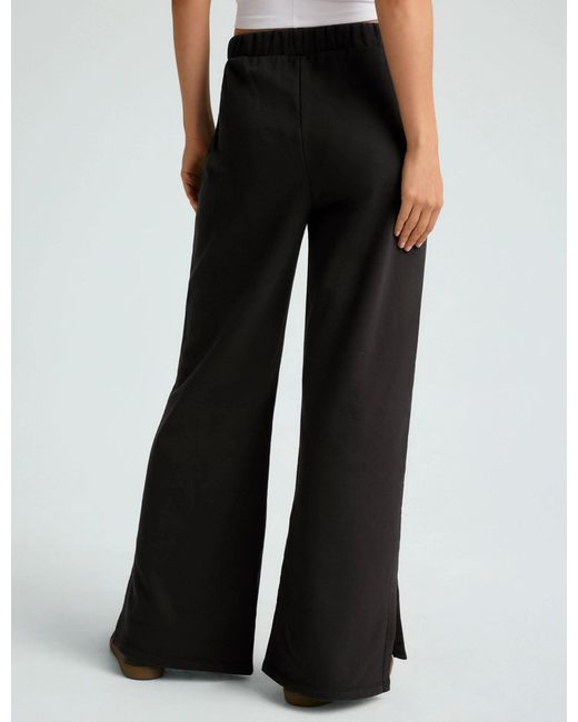 Beyond Yoga Black Women's Open Ended Mid Rise Pant