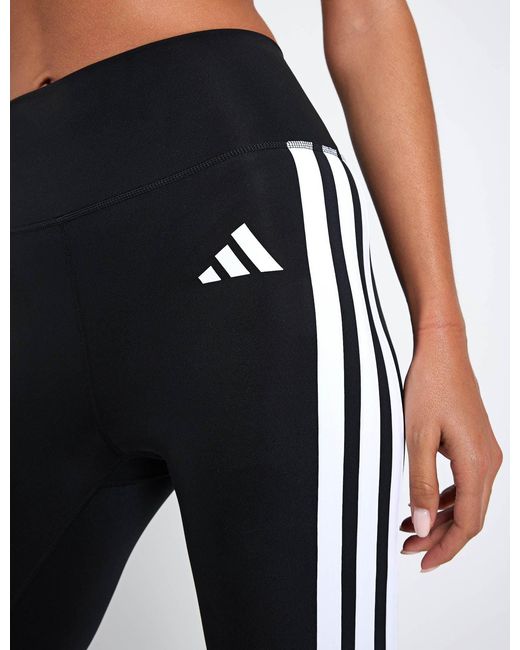 Adidas Black Women's Optime Essentials 3-stripes Flared leggings