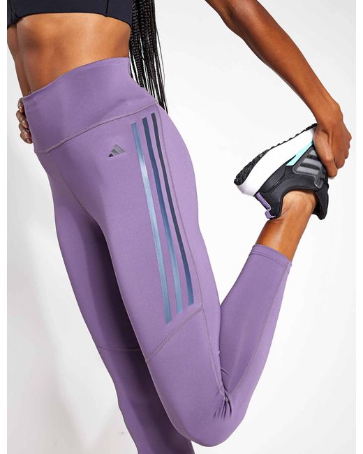 adidas Dailyrun 3-stripes 7/8 leggings in Purple