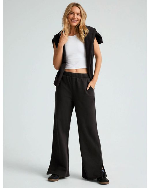 Beyond Yoga Black Women's Open Ended Mid Rise Pant