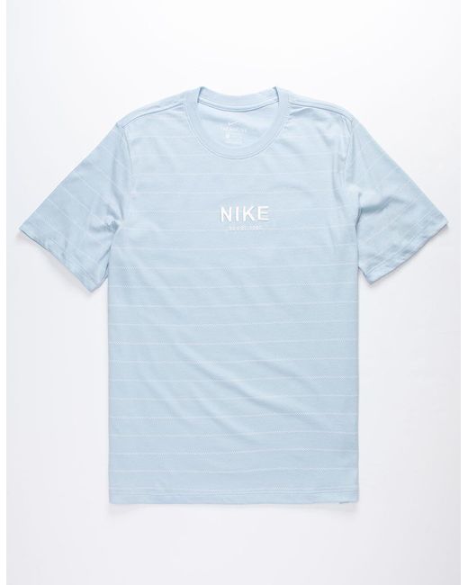 white and light blue nike shirt