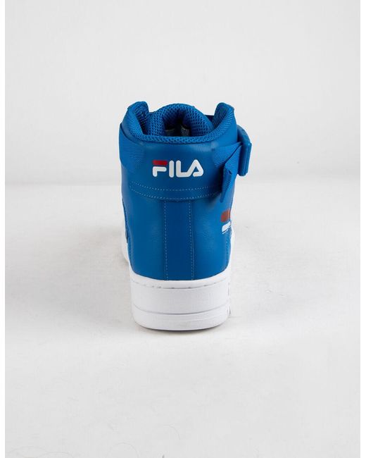 white and blue fila shoes