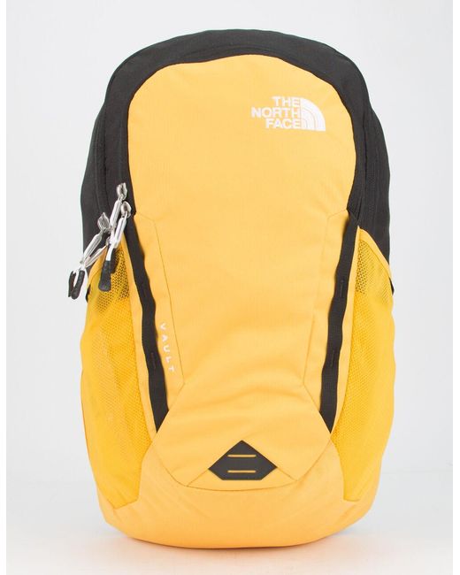 yellow and grey north face backpack