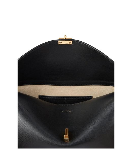 Totême Black T-Lock Leather Clutch Bag