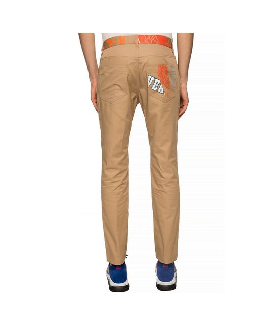 Pantaloni chino Compilation di Versace in Natural da Uomo