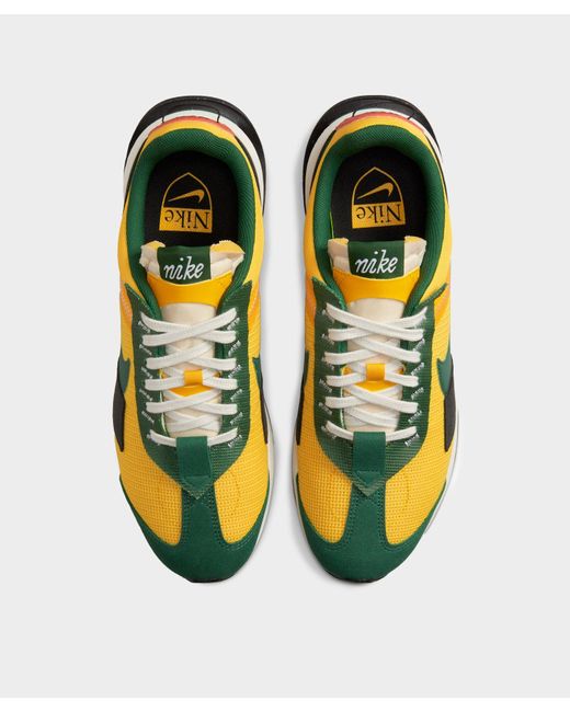 Nike Air Max Pre-Day sneakers in yellow and green