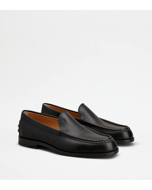 Tod's Black Metal Dots Loafers for men