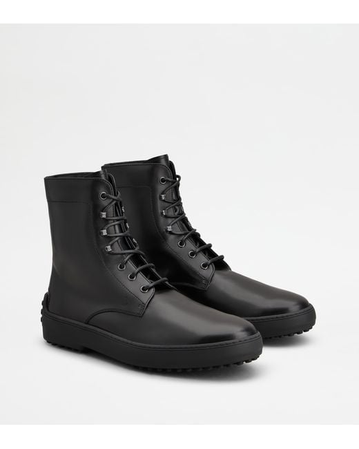 Tod's Black Winter Gommino Ankle Boots for men
