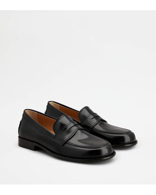 Tod's Black Metal Dots Loafers