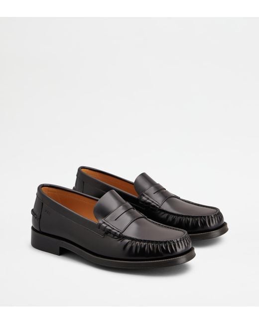 Tod's Black Loafers for men