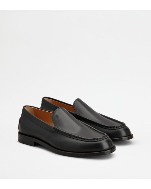 Tod's Black Metal Dots Loafers