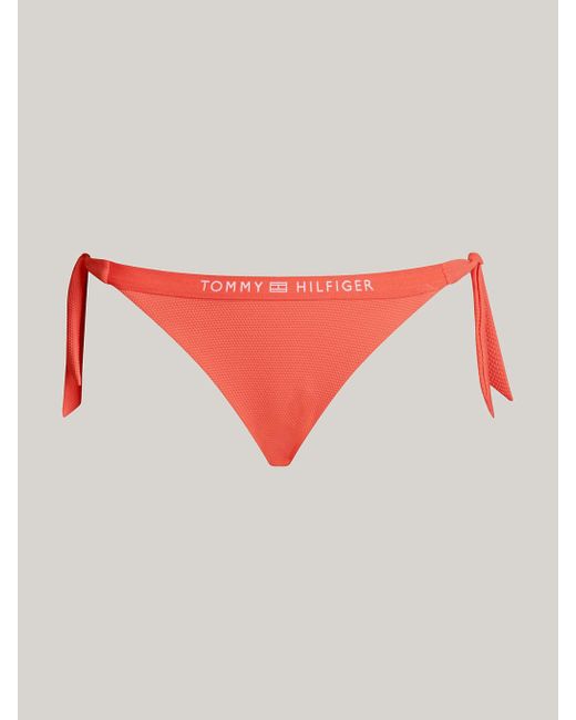 Bas de bikini ton sur ton à nouer à logo Tommy Hilfiger en coloris Orange