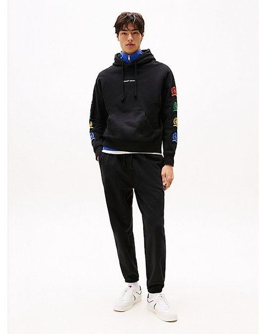 Tommy Hilfiger Crest Relaxed Fit Hoodie Mit Grafik Hinten in Black für Herren