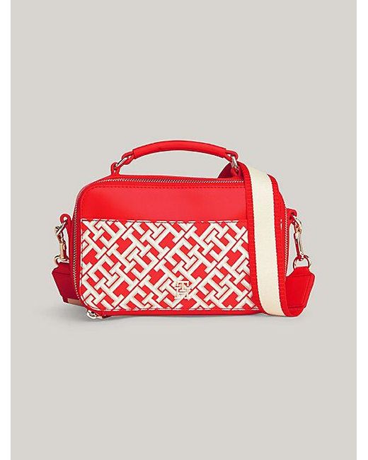 Bolso bandolera Iconic con monogramas TH Tommy Hilfiger de color Red