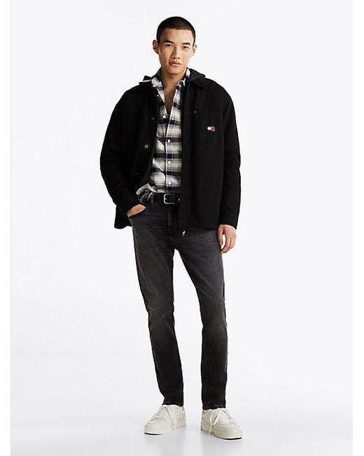 Vaqueros Austin Ajustados Y Cónicos En Negro Tommy Hilfiger de hombre de color Black