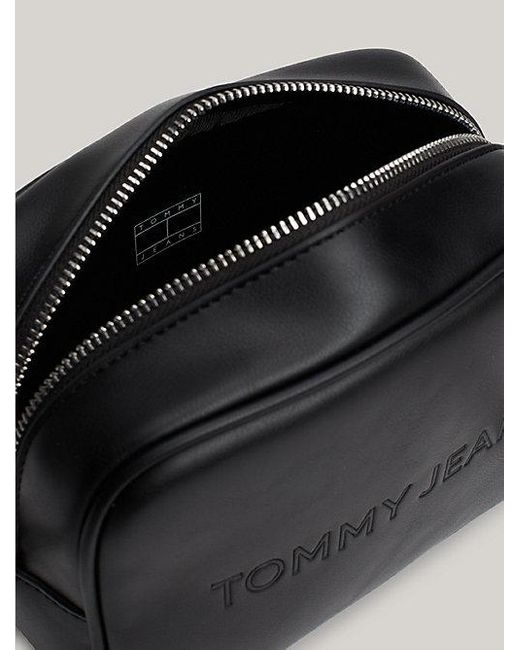 Bolso bandolera Essential con logo en relieve Tommy Hilfiger de color Black