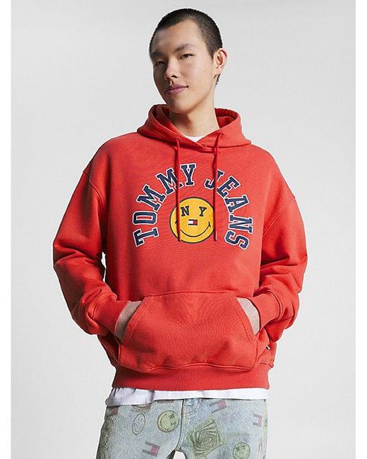 Tommy Hilfiger Tommy Jeans X Smiley® Uniseks Relaxed Hoodie in het Rood  voor heren | Lyst BE