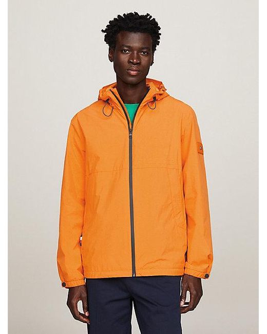 Chaqueta Portland impermeable con capucha Tommy Hilfiger de hombre de color Orange