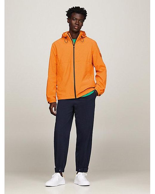 Chaqueta Portland impermeable con capucha Tommy Hilfiger de hombre de color Orange