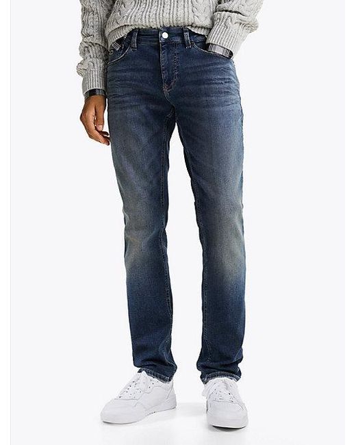 Vaqueros Scanton Ajustados Con Efecto Usado Tommy Hilfiger de hombre de color Blue