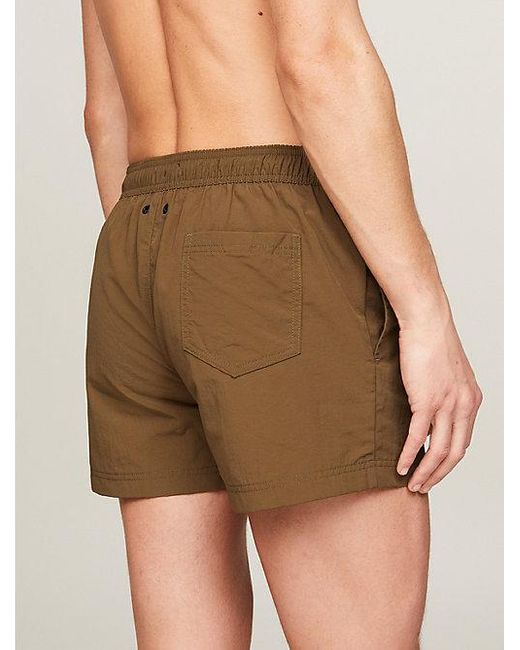 Tommy Hilfiger Slim Fit kurze Badeshorts mit Logo-Tape in Green für Herren