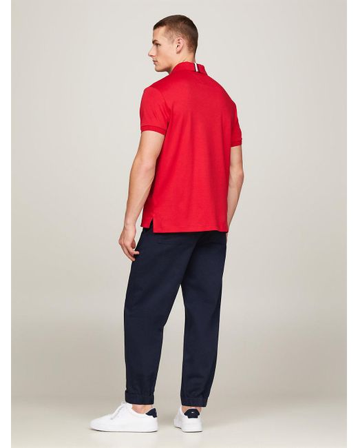 Polo coupe standard Essential à drapeau brodé Tommy Hilfiger pour homme en coloris Red