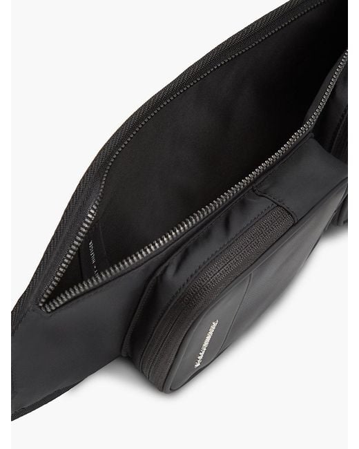 Tommy Hilfiger Black Metal Logo Sling Backpack for men