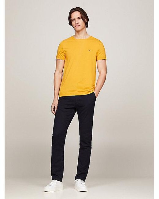 Camiseta de corte extra slim con logo bordado Tommy Hilfiger de hombre de color Orange