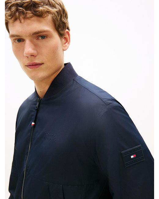 Tommy Hilfiger Blue Water Resistant Tonal Logo Bomber Jacket for men