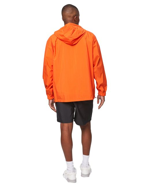 AURALEE Washed Cotton Nylon Weather Hooded Zip in Orange for Men