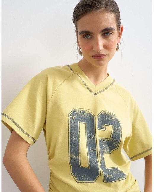 TOPSHOP Natural Micro V-neck Ruched Sides Graphic Tee