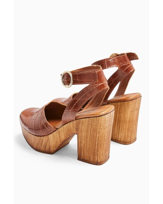 brown platform clogs