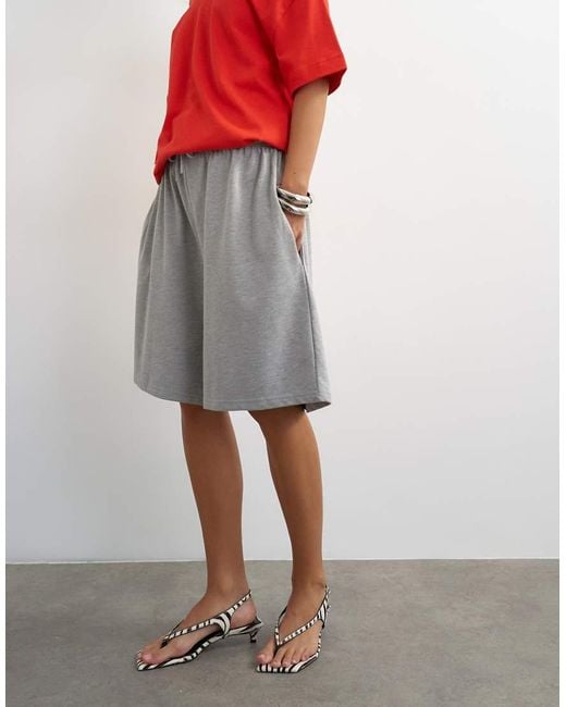 TOPSHOP Red Washed Long Line Tie Detail Shorts