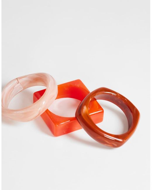 TOPSHOP Orange Flo 3 Pack Resin Bangles