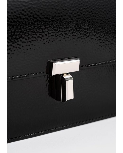 Totême White T-Lock Grained-Patent Crossbody