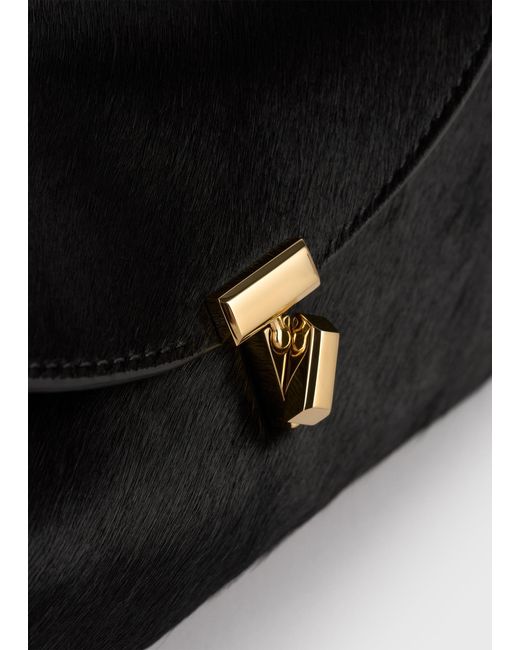 Totême White Mini T-Lock Pony Hair Clutch