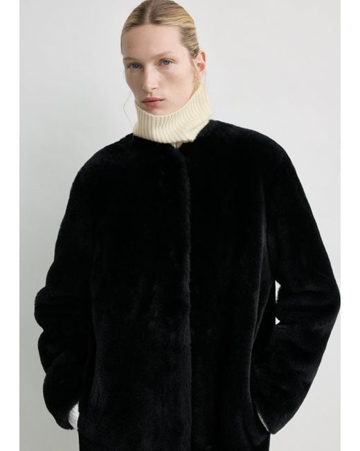 Totême Black Shearling Midi Coat