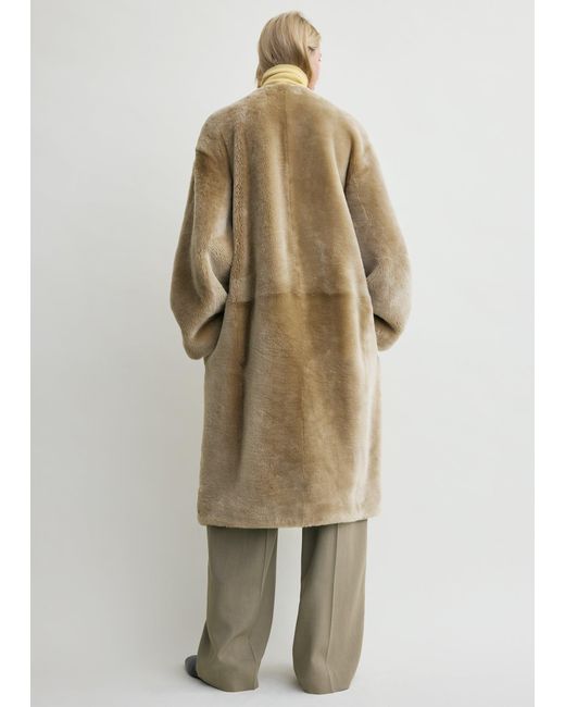 Totême  Natural Collarless Shearling Coat