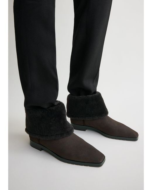 Totême Black Fold-Down Shearling Boots