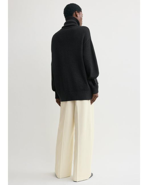 Totême Black Longline Turtleneck