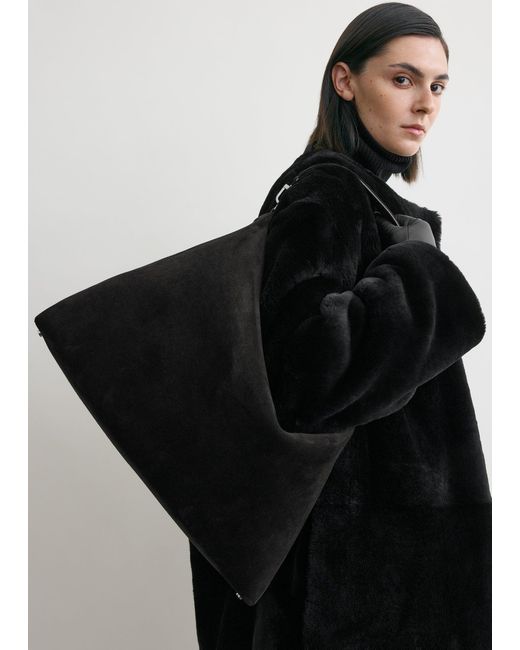 Totême  Black Bevel Suede Bag
