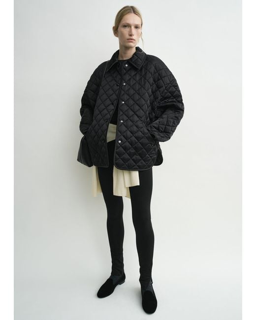 Totême Black Collared Quilted Jacket