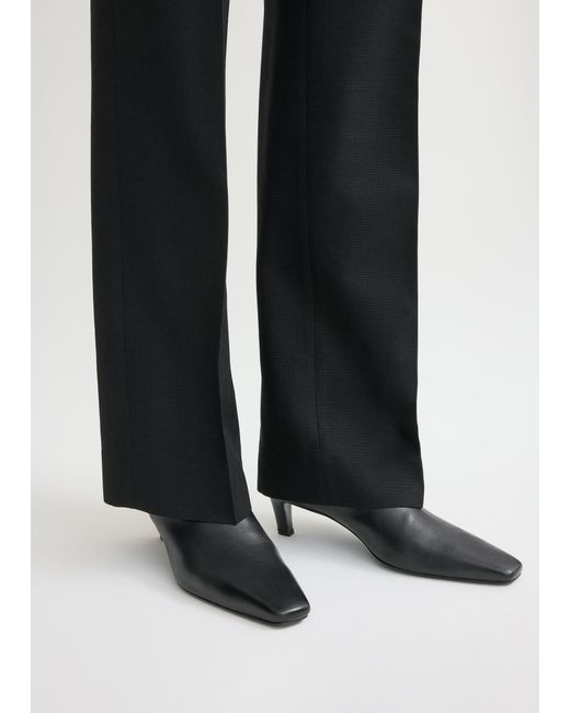 Totême  Black Leather Mid-Heel Boots