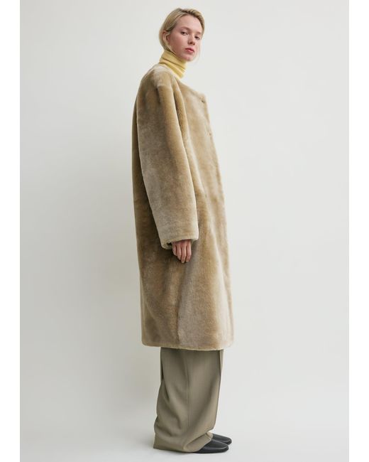 Totême  Natural Collarless Shearling Coat