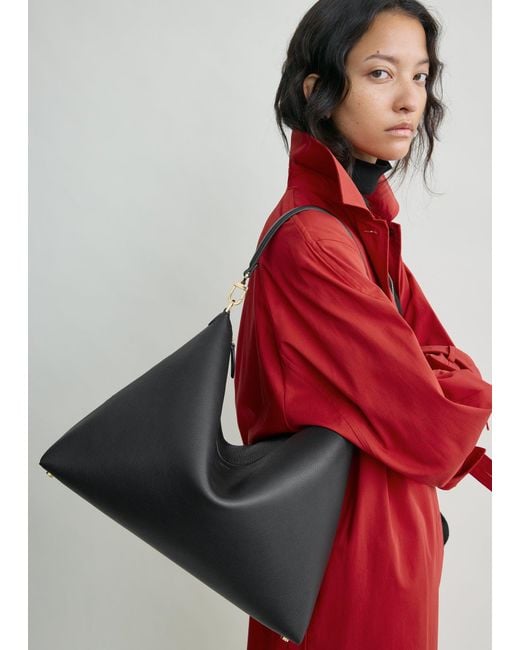 Totême  Black Medium Bevel Grained-Leather Bag