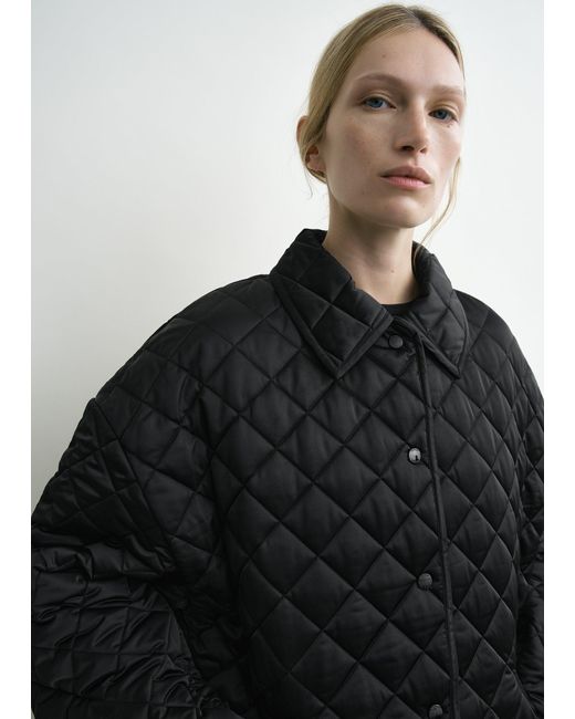 Totême Black Collared Quilted Jacket