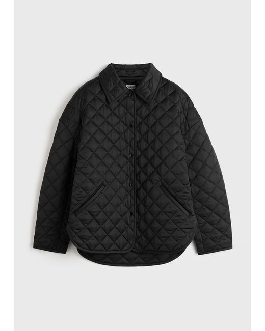 Totême Black Collared Quilted Jacket