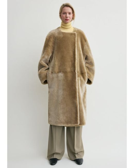 Totême  Natural Collarless Shearling Coat