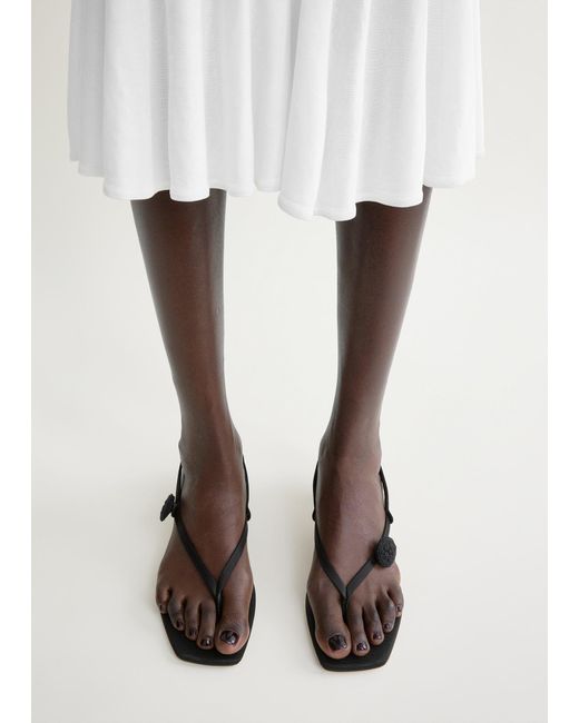 Totême  Black Slingback Satin Flip Flops